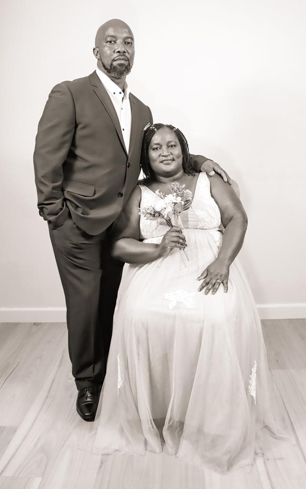 Cathy and Ramson in a black and white formal portrait