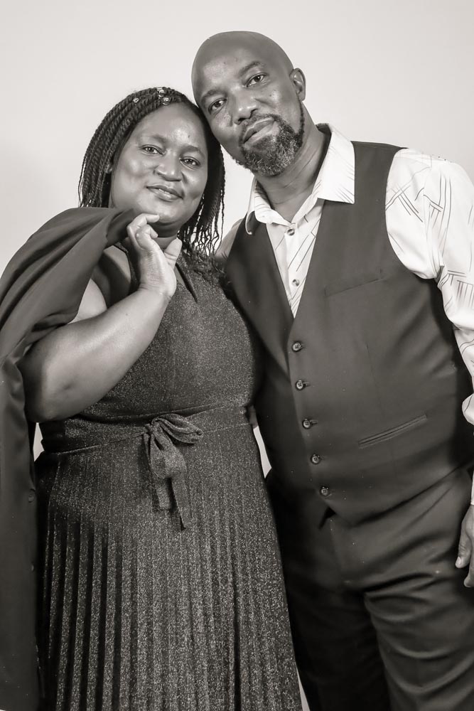 Cathy and Ramson in a black and white portrait